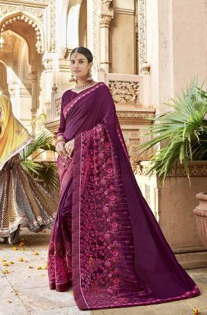 Enhance Your Personality Wearing This Designer Saree In Purple Color Paired With Purple Colored Blouse. This Saree And Blouse Are Silk Based Which Gives A Rich Look To Your Personality. 