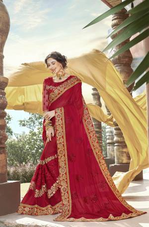 Adorn The Pretty Angelic Look In This Heavy Designer Red Colored Saree Paired With Red Colored Blouse., This Saree Is Georgette Based Paired With Art Silk And Net Fabricated Blouse. Its Saree And Blouse Are Beautified With Heavy Embroidery. 