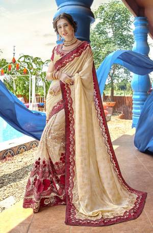 Enhance Your Personality In This Designer Rich Looking Saree In Cream Color Paired With Cream Colored Blouse, This Saree Is Fabricated On Georgette Paired With Art Silk Fabricated Blouse. 