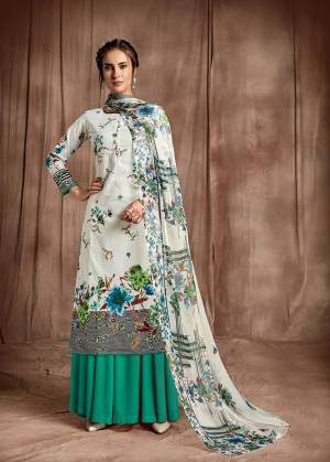 Beautifull  floral digital printed sharara  style salwar suit comes with cotton fabric bottom & beautiful Printed dupatta. The suit which can be stitched up to size 44. Pair it with high heels and look effortlessly chic and fashionable.