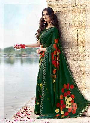 Grab This Designer Simple And Elegant Looking Saree In Dark Green Color Paired With Dark Green Colored Blouse. This Saree Is Fabricated On Georgette Paired With Art Silk Fabricated Blouse. 
