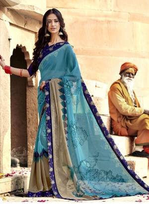 Celebrate This Festive Season With Beauty And Comfort Wearing This Saree In Blue Color Paired With Royal Blue Colored Blouse. This Saree Is Georgette Based Paired With Art Silk Fabricated Blouse. 