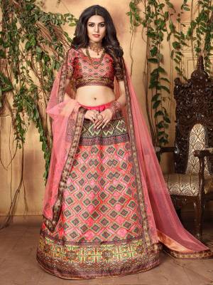 This Festive Season, Look The Most Unique And Prettiest Of All Wearing This Designer Lehenga Choli Fabricated On Jari Satin Beautified With Attractive Digital Prints Paired With Net Fabricated Dupatta Beautified With Stone Work. 