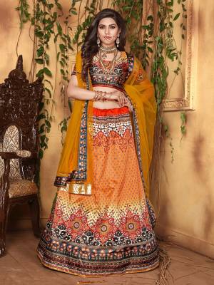 Grab This Designer Colorful Lehenga Choli Fabricated On Jari Satin Paired With Net Fabricated Dupatta. Its Blouse And Lehenga Are Beautified With Digital Prints And Dupatta With Stone Work. Buy This Designer Piece Now. 