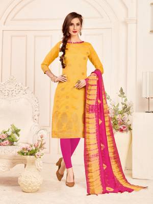 Celebrate This Festive Season With Beauty And Comfort Wearing This Straight Suit In Musturd Yellow Colored Top Paired With Contrasting Rani Pink Colored Bottom And Dupatta. Its Top And Dupatta Are Fabricated On Banarasi Jacquard Silk Paired With Cotton Bottom. Buy This Dress Material Now.