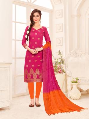 For A Bold And Beautiful Look, Grab This Designer Dress Material In Dark Pink Colored Top Paired With Orange Colored Bottom And Orange & Dark Pink Colored Dupatta. Its Top Is Fabricated On Banarasi Jacquard Silk Paired With Cotton Bottom And Banarasi Dupatta. Get This Stitched As Per Your Desired Fit And Comfort.