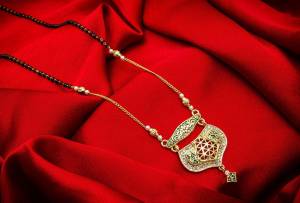 Rich And Elegant Looking Designer Mangalsutra Is Here In Golden Color. It Is Beautified With Stone Work And Also Light Weight Which Is Easy To Carry All Day Long. 
