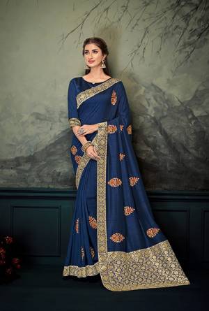Enhance Your Personality Wearing This Designer Silk Based Saree In Navy Blue Color Paired With Navy Blue Colored Blouse, This Saree And Blouse Are Silk Based With Highligted Jacquard Silk Pallu. It Has Pretty Embroidered Butti All Over It.