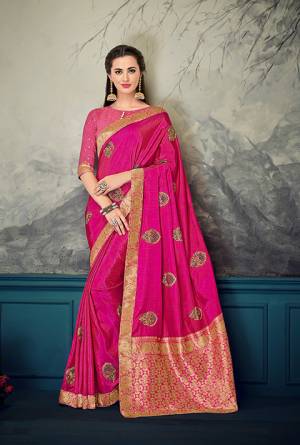 Enhance Your Personality Wearing This Designer Silk Based Saree In Rani Pink Color Paired With Rani Pink Colored Blouse, This Saree And Blouse Are Silk Based With Highligted Jacquard Silk Pallu. It Has Pretty Embroidered Butti All Over It.