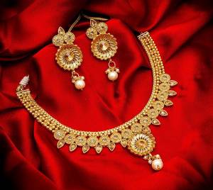 Grab This Heavy Necklace Set For The Upcoming Wedding Season. Pair This Up With Your Heavy Ethnic Attire And As It Is In Golden Color, It Can Be Paired With Any Colored Attire. Buy Now