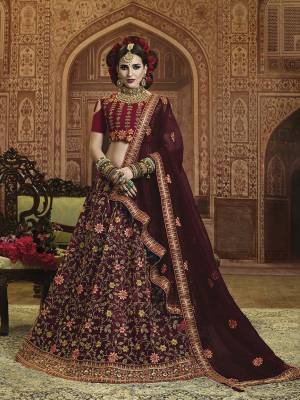 For A Royal Look, Grab This Heavy Designer Lehenga Choli In Red Colored Blouse Paired With Contrasting Maroon Colored Lehenga And Dupatta, Its Blouse Is Fabricated On Art Silk Paired With Heavy Embroidered Orgenza Silk Lehenga And Dupatta. 
