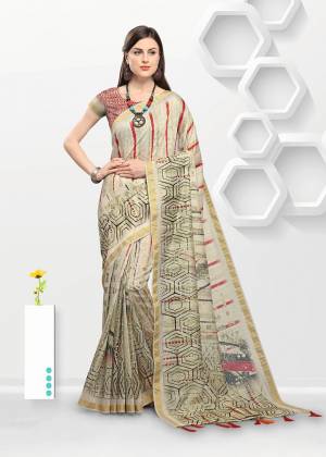 For Your Semi-Casuals Or Festive Wear. Grab This Pretty Light Weight Printed Saree Fabricated On Linen. It Is Beautified With Prints All Over And Its Fabric Is Light Weight, Durable And Easy To Care For. 