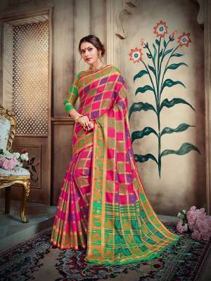 Go Colorful With This Designer Silk Based Saree In Dark Pink And Purple Color Paired With Contrasting Green Colored Blouse. This Saree And Blouse Are Fabricated On Lichi Art Silk Beautified With Weave All Over. 