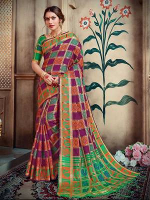 Celebrate This Festive Season With Beauty And Comfort Wearing This Designer Silk Based Saree In Wine And Green Color Paired With Green Colored Blouse. This Saree And Blouse are Fabricated On Lichi Art Silk Beautified With Weave All Over.  Buy This Saree Now.