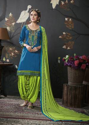 Pretty Common And Evergreen Color Pallete Is Here With This Designer Embroidered Suit In Blue Colored Top Paired With Contrasting Green Colored Bottom And Dupatta. Its Top Is Cotton Silk Based Paired With Rayon Bottom And Chiffon Fabricated Dupatta. 
