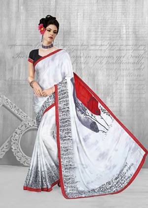 For Your Semi-Casuals, Grab This Pretty Printed Saree In White Color Paired With Black Colored Blouse. This Saree And Blouse Are Fabricated On Crepe Beautified With Prints All Over. Buy Now.