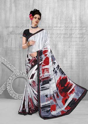 For Your Semi-Casuals, Grab This Pretty Printed Saree In White And Grey Color Paired With Black Colored Blouse. This Saree And Blouse Are Fabricated On Crepe Beautified With Prints All Over. Buy Now.