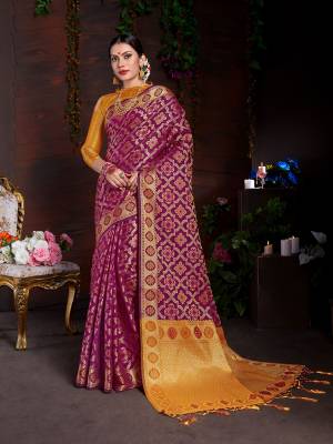 Bright And Visually Appealing Color Is Here With This Designer Saree In Magenta Pink Color Paired With Contrasting Musturd Yellow Colored Blouse. This Saree And Blouse Are Fabricated On Lichi Art Silk Beautified With Heavy Weave All Over It. 