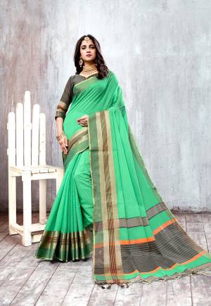 Here Is Rich and Elegant Looking Mustu Have Patterned Saree IS Here In Sea Green Color Paired With Grey Colored Blouse. This Saree And Blouse Are Fabricated On Cotton Silk Beautified With Attractive Lace Border.