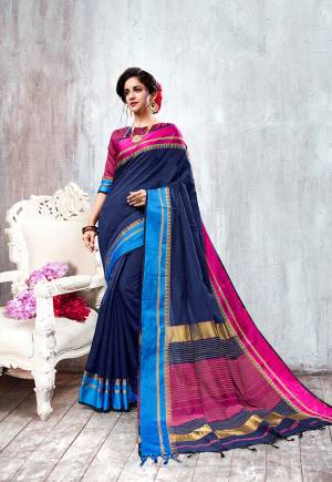 Enhance Your Personality In This Rich And Elegant Looking Saree In Navy Blue Color Paired With Contrasting Magenta Pink Colored Blouse. This Saree And Blouse Are Fabricated On Cotton Silk Which Is Light Weight And Easy To Carry All Day Long. 