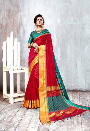 Beautiful Shade Is Here To Add Into Your Wardrobe With This Elegant Looking Saree In Red Color Paired With Contrasting Teal Blue Colored Blouse. This Saree And Blouse Are Fabricated On Cotton Silk Beautified With Weave All Over. 