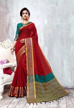 Here Is Rich and Elegant Looking Mustu Have Patterned Saree IS Here In Red Color Paired With Teal Blue Colored Blouse. This Saree And Blouse Are Fabricated On Cotton Silk Beautified With Attractive Lace Border.