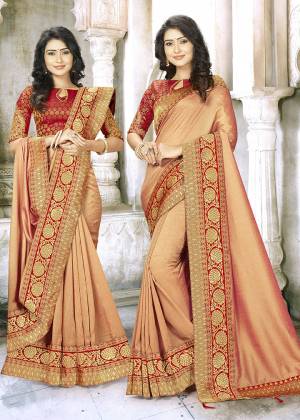 A Must Have Shade In Every Womens Wardrobe Is Here With This Designer Saree In Peach Color Paired With Contrasting Red Colored Blouse. This Saree Is Fabricated On Chinon Silk Paired With Jacquard Silk Fabricated Blouse. 