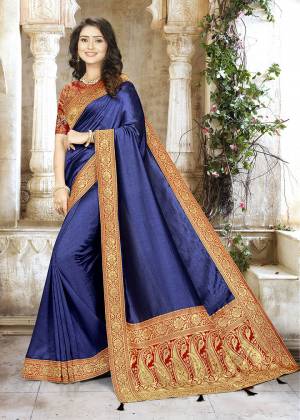 Bright And Visually Appealing Color Is Here With This Designer Saree In Royal Blue Color Paired With Contrasting Red Colored Blouse. This Saree Is Fabricated On Chinon Silk Paired With Jacquard Silk Fabricated Blouse. Buy Now.