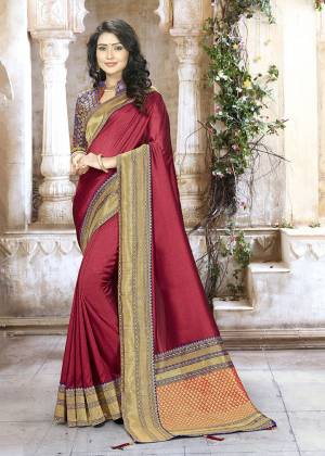 Grab This Beautiful And Attractive Looking Designer Saree In Magenta Pink Color Paired With Contrasting Violet Blouse. This Saree Is Fabricated On Chinon Silk Paired With Jacquard Silk Fabricated Blouse. 