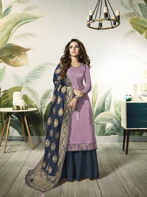Add This Very Pretty Designer Indo-Western Suit To Your Wardrobe For The Upcoming Festive And Wedding Season. Its Light Purple Colored Top Is Fabricated On Satin Silk Paired With Contrasting Navy Blue Colored Bottom And Dupatta. Its Bottom Is Fabricated On Santoon Paired With Jacquard Silk Fabricated Dupatta. Buy Now.