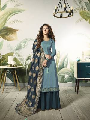 Add This Very Pretty Designer Indo-Western Suit To Your Wardrobe For The Upcoming Festive And Wedding Season. Its Light Blue Colored Top Is Fabricated On Satin Silk Paired With Teal Blue Colored Bottom And Dupatta. Its Bottom Is Fabricated On Santoon Paired With Jacquard Silk Fabricated Dupatta. Buy Now.