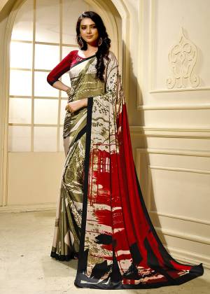 For Your Semi-Casuals, Grab This Pretty Printed Saree With Abstract Prints All Over. This Saree And Blouse Are Fabricated On Crepe Beautified With Prints All Over. Buy Now.