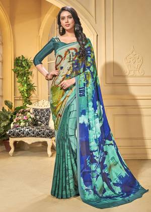 Add This Pretty Saree To Your Wardrobe For Your Casual Or Semi-Casual Wear. This Saree And Blouse Are Fabricated On Crepe Beautified With Abstract Prints All Over It. Buy Now