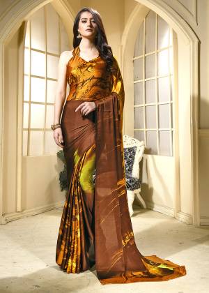 For Your Semi-Casuals, Grab This Pretty Printed Saree With Abstract Prints All Over. This Saree And Blouse Are Fabricated On Crepe Beautified With Prints All Over. Buy Now.