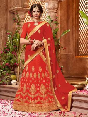Shine Bright In This Beauitful Designer Heavy Lehenga Choli In All Red Pink Color. Its Blouse And Lehenga Are Art Silk Based Paired With Chiffon Fabricated Dupatta. It Is Beautified With Heavy Jari And Thread Work. 