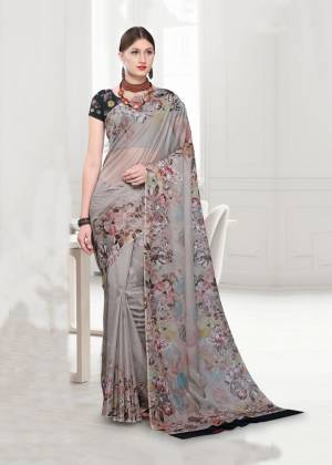 For A Rich And Elegant Look In Your Semi-Casuals, Grab this Beautiful Designer Saree Fabricated On Georgette. This Saree Is Beautified Abstract Floral Prints Which Gives A New, Unique And Trendy Look. Buy This Pretty Saree Now.