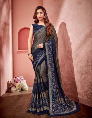 This Subtly shining  saree is all set to up your fashion game. Dipped in rich pigments of Navy blue and gold, be ready to look mesmerizing. 