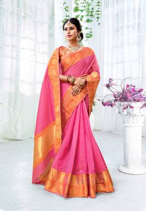 Look Pretty In This Designer Silk Based Saree In Dark Pink Color Paired With Contrasting Orange Colored Blouse. This Saree Is Fabricated On Cotton Silk Paired With Brocade Fabricated Blouse. It Is Beautified With Weave All Over Giving It An Attractive Look. 