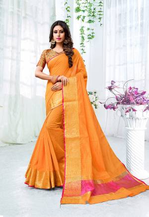 Celebrate This Festive Season With Beauty, Comfort A Beautiful Touch Of Traditional Colors With This Designer Saree In Musturd Yellow Color Paired With Contrasting Red Colored Blouse. This Saree Is Fabricated On Cotton Silk Paired With Brocade Fabricated Blouse. It Is Beautified With Weave Giving It An Enhanced Look.