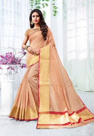 Add This Beautiful Designer Saree To Your Wardrobe For The Upcoming Festive And Wedding Season With This Silk Based Saree In Beige Color Paired With Contrasting Maroon Colored Blouse. This Saree Is Fabricated On Cotton Silk Paired With Brocade Fabricated Blouse. 