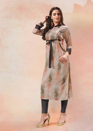 Go Colorful With This Grey Colored Readymade Kurti Fabricated On Rayon. This Kurti Is Beautified With Prints And Suitable For Your Casual And Semi-Casuals. 