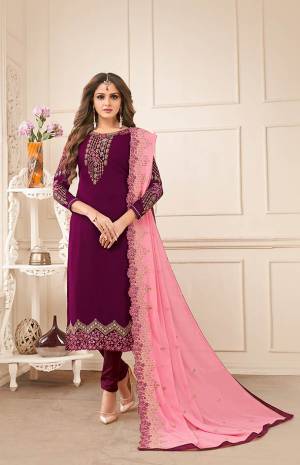 Add This Very Pretty Designer Straight Suit To Your Wardrobe In Purple Color Paired With Contrasting Pink Colored Dupatta. Its Embroidered Top And Dupatta Are Fabricated On Georgette Paired With Santoon Bottom. It Has Pretty Embroidery Giving It An elegant Look.
