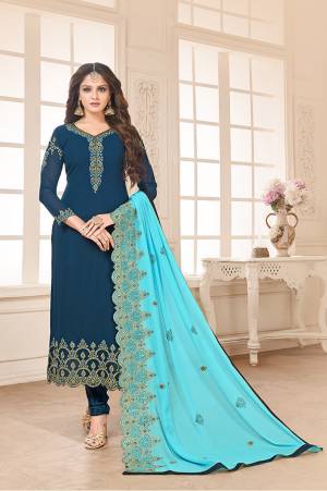 Go with The Shades Of Blue With This Designer Straight Cut Suit In Blue Color Paired With Sky Blue Colored Dupatta. Its Top And Dupatta Are Fabricated On Georgette Paired With Santoon Bottom. Its Heavy Embroidery Over The Top And Dupatta Is Giving This Dress An Enhanced Look. 