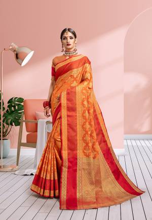 Add This Beautiful Designer Silk Based Saree In Orange Color Paired With Orange Colored Blouse. This Saree Is Fabricated On Banarasi Art Silk Paired With Art Silk Fabricated Blouse. It IS Beautified With Heavy Attractive Weave Which Earn You Lots Of Compliment From Onlookers. 