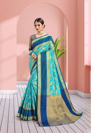 Rich And Elegant Looking Designer Silk Based Saree Is Here In Sky Blue Color Paired With Contrasting Gold & Navy Blue Colored Blouse. This Saree Is Fabricated On Banarasi Art Silk Paired With Art Silk Fabricated Blouse. Buy This Saree Now.