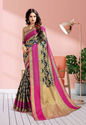 Rich And Elegant Looking Designer Silk Based Saree Is Here In Navy Blue Color Paired With Contrasting Gold & Dark pink Colored Blouse. This Saree Is Fabricated On Banarasi Art Silk Paired With Art Silk Fabricated Blouse. Buy This Saree Now.