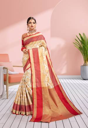 Add This Beautiful Designer Silk Based Saree In Off-White Color Paired With Gold & Red Colored Blouse. This Saree Is Fabricated On Banarasi Art Silk Paired With Art Silk Fabricated Blouse. It IS Beautified With Heavy Attractive Weave Which Earn You Lots Of Compliment From Onlookers. 