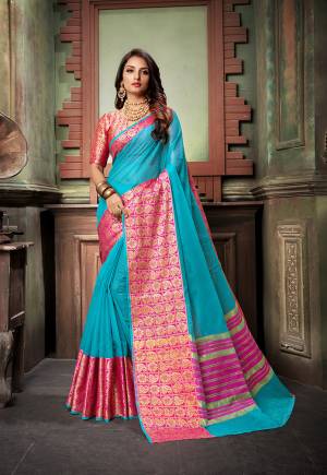 Celebrate This Festive Season With Beauty And Comfort With This Designer Saree In Blue Color Paired With Contrasting Pink Colored Blouse. This Saree Is Fabricated On Cotton Silk Paired With Art Silk Fabricated Blouse