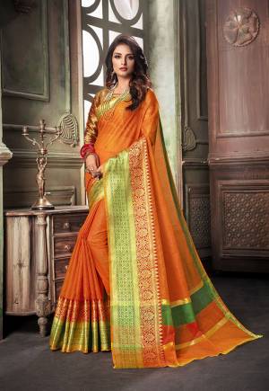Celebrate This Festive Season With Beauty And Comfort With This Designer Saree In Orange Color Paired With Contrasting Maroon Colored Blouse. This Saree Is Fabricated On Cotton Silk Paired With Art Silk Fabricated Blouse