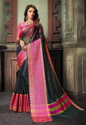 Here Is A Very Pretty Designer Saree For The Upcoming Festive And?Wedding Season. Grab This Pretty Saree In Black Color Paired With Dark Pink Colored Blouse. This Saree Is Fabricated On Cotton Silk Paired With Art Silk Fabricated Blouse. Buy This Saree Now